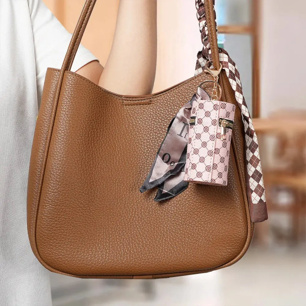 High-end luxury coin purse pendants, earphone cases, lipstick mini keychain bags, retro bucket mouth red envelopes, and simple p luxecrown.co.uk