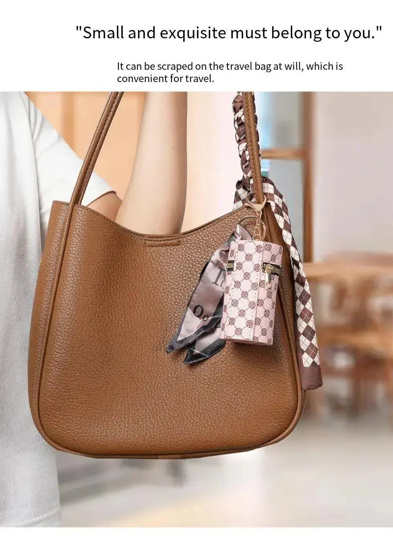 High-end luxury coin purse pendants, earphone cases, lipstick mini keychain bags, retro bucket mouth red envelopes, and simple p luxecrown.co.uk
