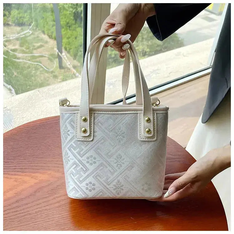 New Ethnic Style Wanji Pattern Bucket Bag Casual Crossbody Lightweight Luxury Urban Simple PU Leather Fashion Handbag luxecrown.co.uk