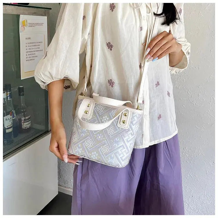 New Ethnic Style Wanji Pattern Bucket Bag Casual Crossbody Lightweight Luxury Urban Simple PU Leather Fashion Handbag luxecrown.co.uk