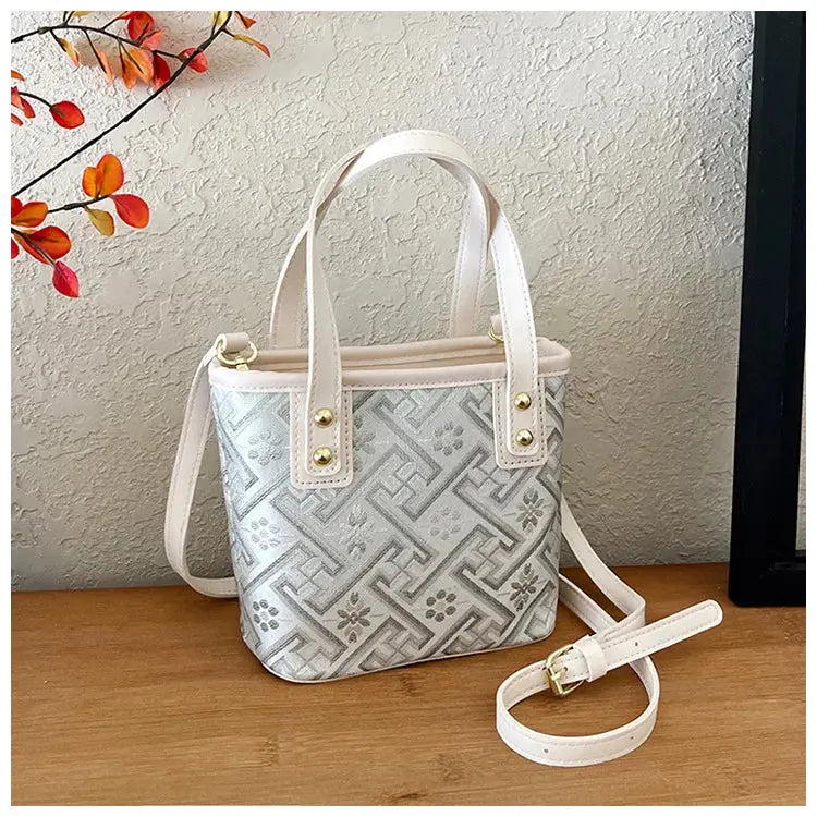 New Ethnic Style Wanji Pattern Bucket Bag Casual Crossbody Lightweight Luxury Urban Simple PU Leather Fashion Handbag luxecrown.co.uk