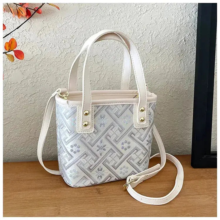 New Ethnic Style Wanji Pattern Bucket Bag Casual Crossbody Lightweight Luxury Urban Simple PU Leather Fashion Handbag luxecrown.co.uk