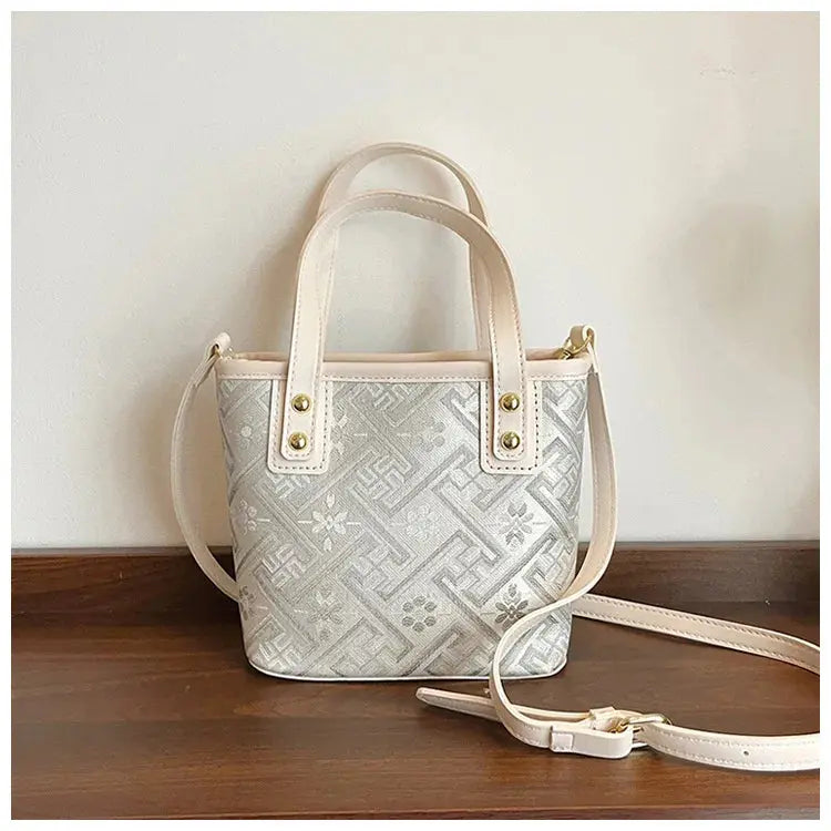New Ethnic Style Wanji Pattern Bucket Bag Casual Crossbody Lightweight Luxury Urban Simple PU Leather Fashion Handbag luxecrown.co.uk