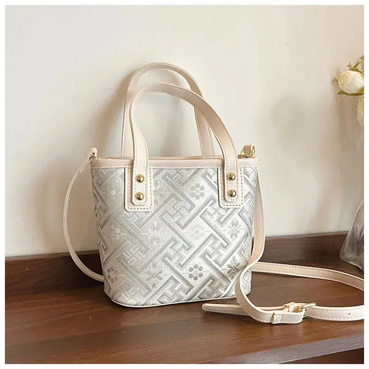 New Ethnic Style Wanji Pattern Bucket Bag Casual Crossbody Lightweight Luxury Urban Simple PU Leather Fashion Handbag luxecrown.co.uk