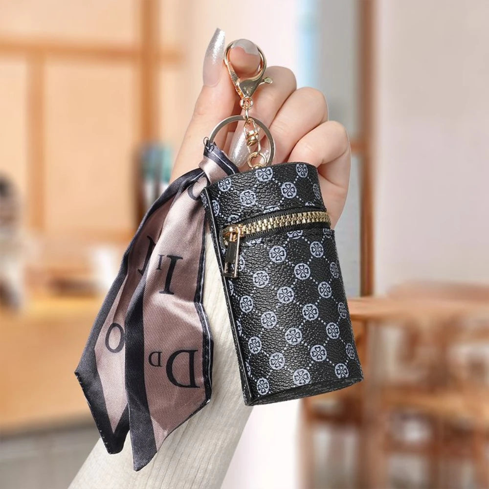 High-end luxury coin purse pendants, earphone cases, lipstick mini keychain bags, retro bucket mouth red envelopes, and simple p luxecrown.co.uk