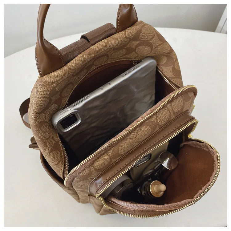 Large-capacity casual women's backpack with vintage textured coating, suitable for travel. luxecrown.co.uk