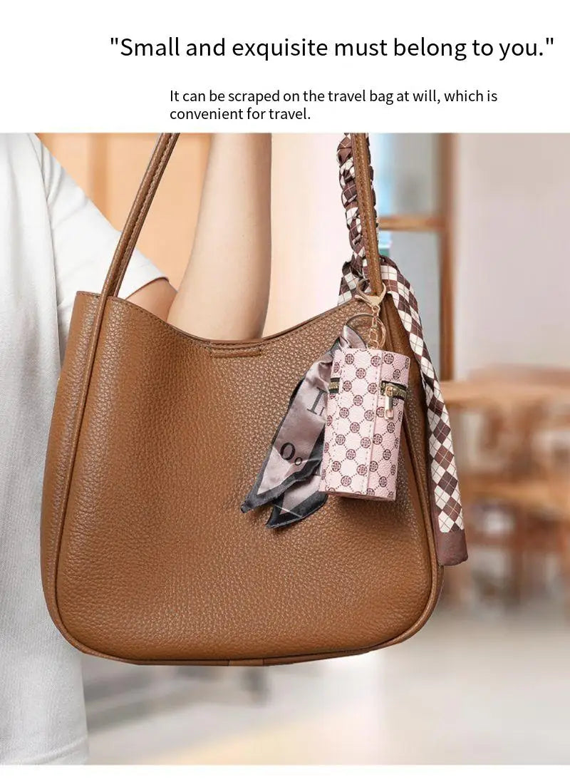 High-end luxury coin purse pendants, earphone cases, lipstick mini keychain bags, retro bucket mouth red envelopes, and simple p luxecrown.co.uk