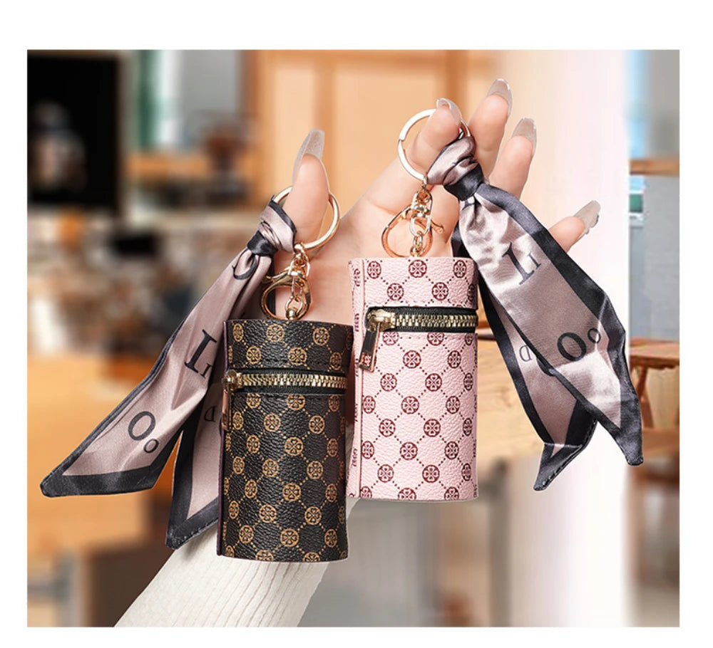 High-end luxury coin purse pendants, earphone cases, lipstick mini keychain bags, retro bucket mouth red envelopes, and simple p luxecrown.co.uk
